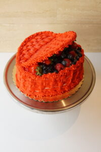 savor the classic flavor of a strawberry shortcake heart cake at Mia's Bakery.