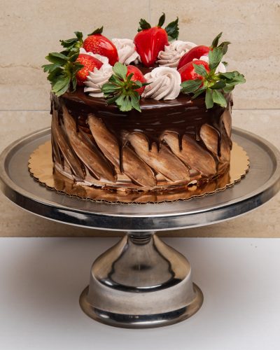 savor the classic flavor of our traditional 7 layer cake at Mia's Bakery.