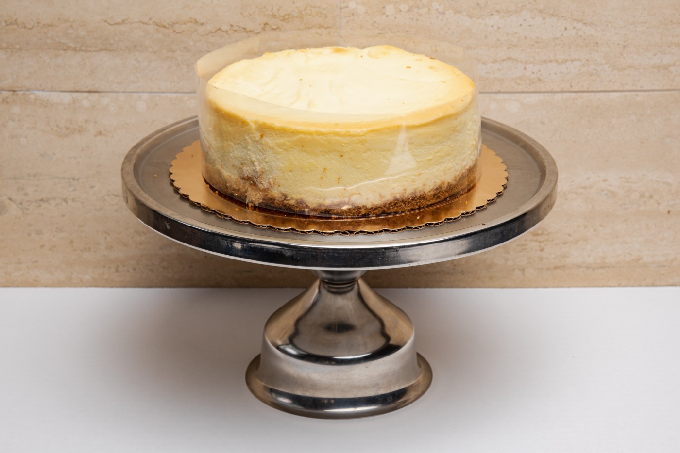 New York cheesecake savor the classic flavor of a traditional New York cheesecake at Mia's Bakery.