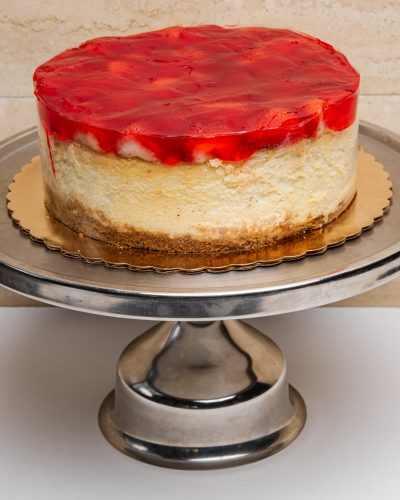 savor the classic flavor of a traditional strawberry cheesecake at Mia's Bakery.