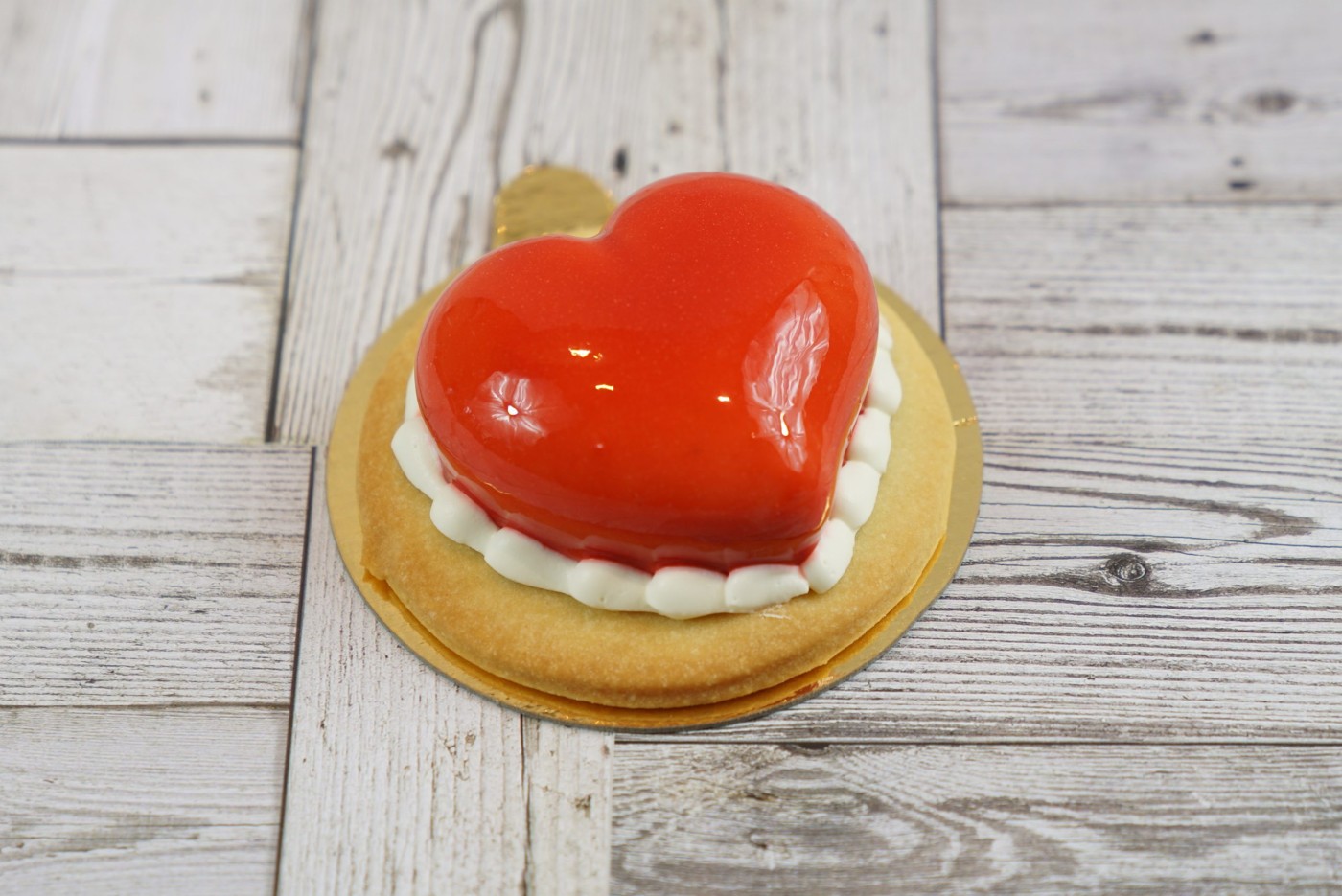 raspberry tart savor the classic flavor of a raspberry tart at Mia's Bakery.
