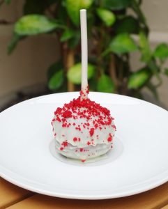 savor the classic flavor of red velvet cake pops at Mia's Bakery.