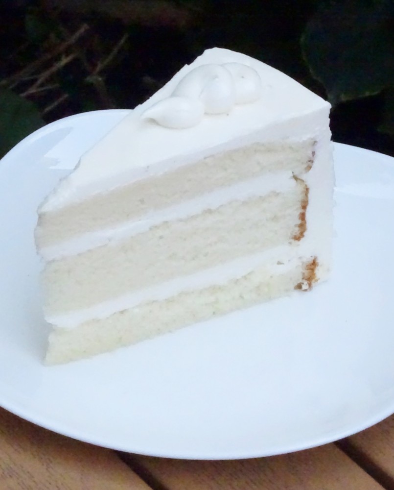 vanilla bean cake slice savor the classic flavor of a traditional vanilla bean cake slice at Mia's Bakery.