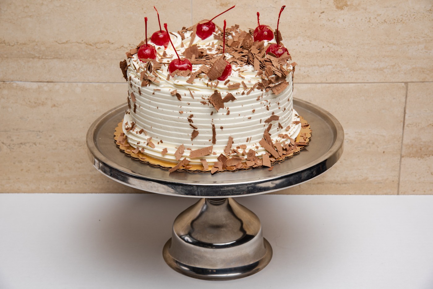 black forest cake savor the classic flavor of a traditional black forest cake at Mia's Bakery.