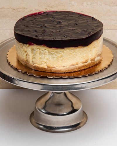 savor the classic flavor of a New York style blueberry cheesecake at Mia's Bakery.