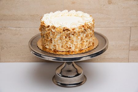 indulge in the delightful burnt almond cake at Mia's Bakery.