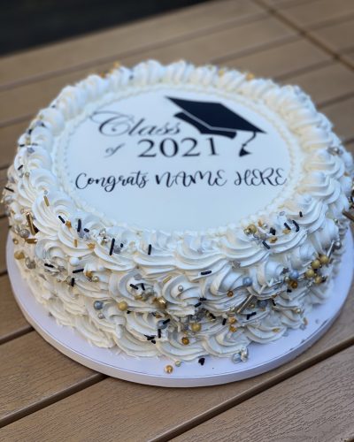 savor the classic flavor of a custom graduation cake at Mia's Bakery.