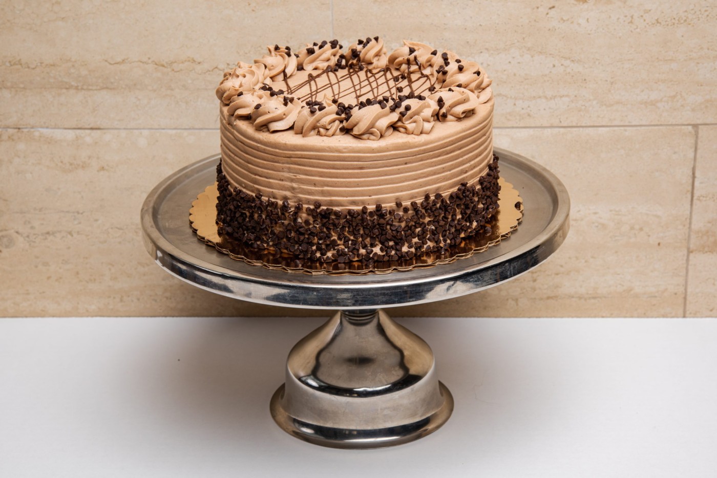 nutella cake savor the classic flavor of a traditional nutella cake at Mia's Bakery.