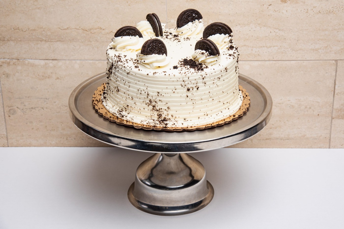 oreo cake savor the classic flavor of a traditional oreo cake at Mia's Bakery.