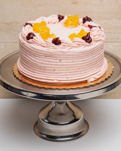 savor the classic flavor of a traditional peach raspberry cake at Mia's Bakery.