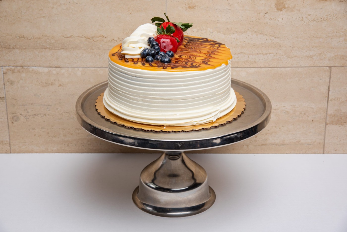 salted caramel cake savor the classic flavor of a homemade salted caramel cake at Mia's Bakery.