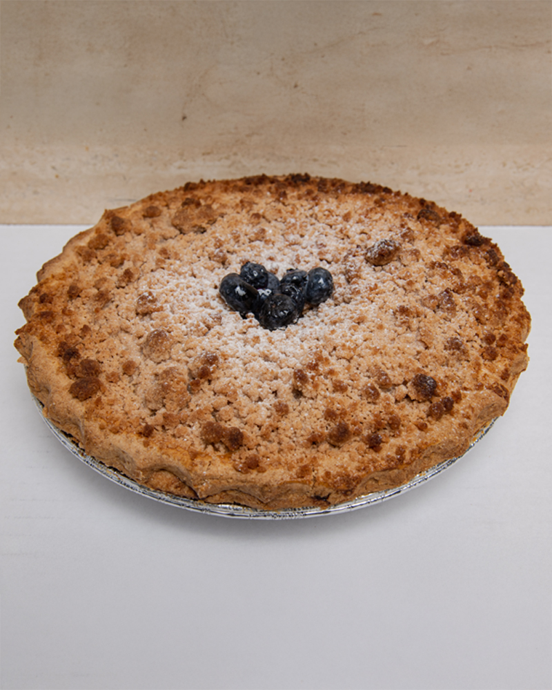 blueberry crumb pie savor the classic flavor of a traditional blueberry crumb pie at Mia's Bakery.