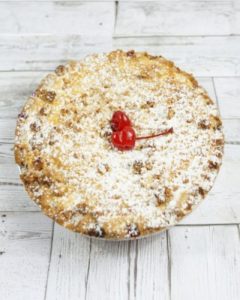 savor the classic flavor of a traditional cherry crumb pie at Mia's Bakery.