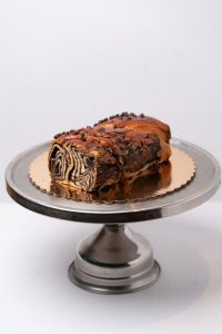 savor the classic flavor of a traditional chocolate babka at Mia's Bakery.