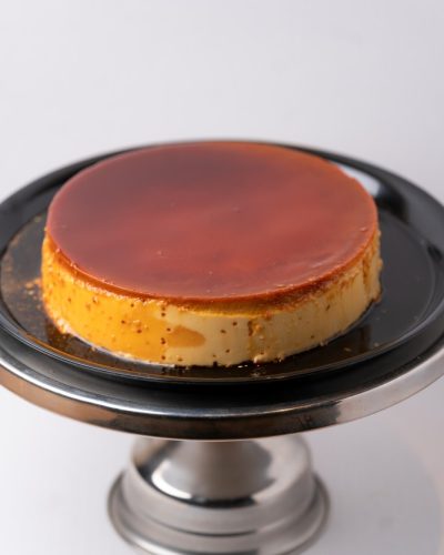 savor the classic flavor of a traditional flan at Mia's Bakery.
