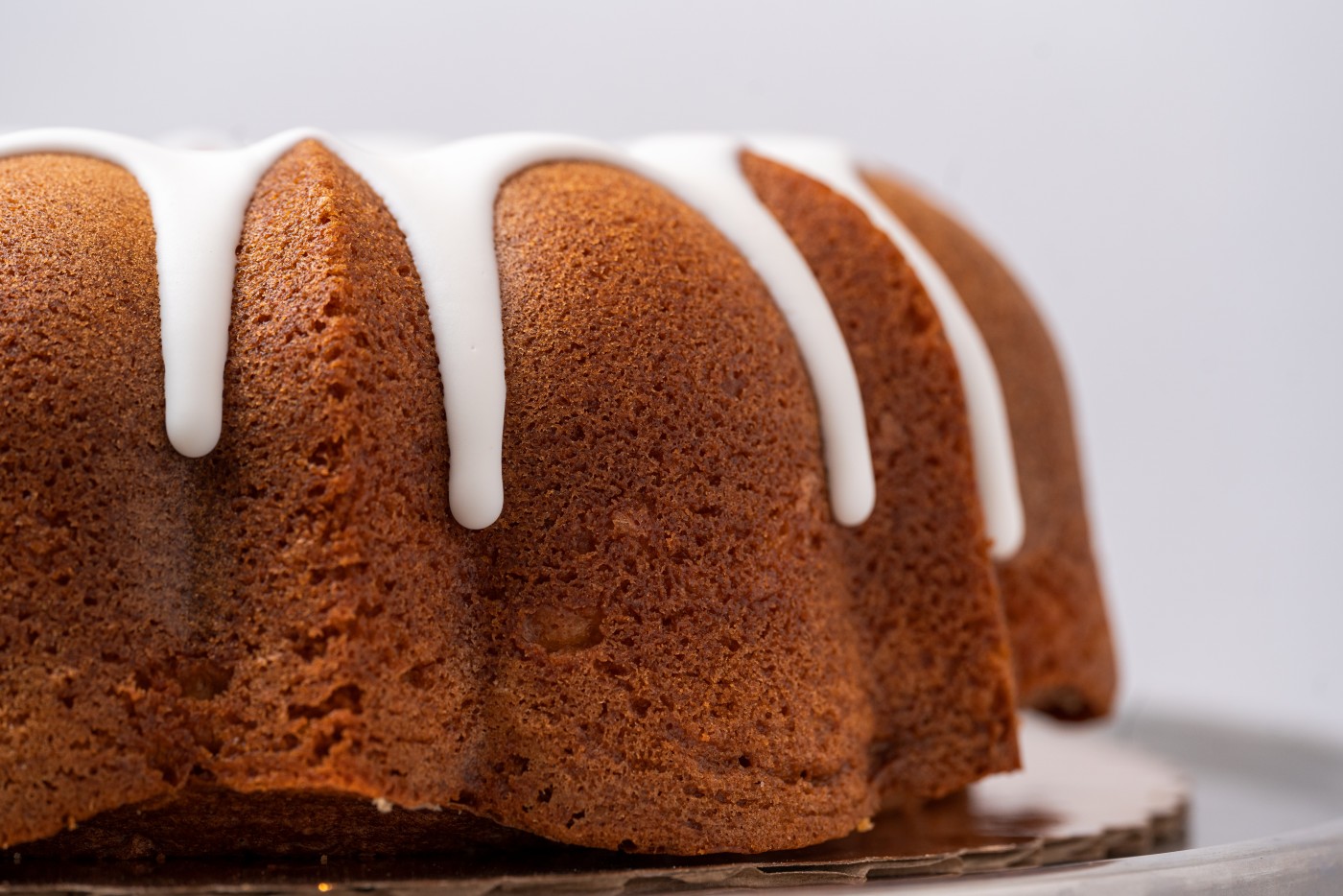 Lemon Bundt Cake savor the classic flavor of a homemade lemon bundt cake at Mia's Bakery.