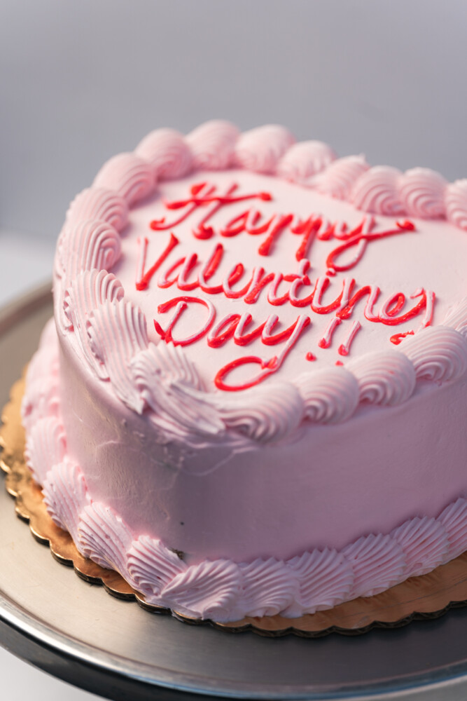 chocolate strawberry heart cake savor the classic flavor of a chocolate strawberry heart cake at Mia's Bakery.
