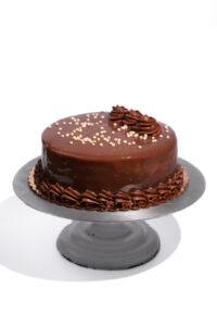savor the classic flavor of a gluten-free caramel mocha cake at Mia's Bakery.