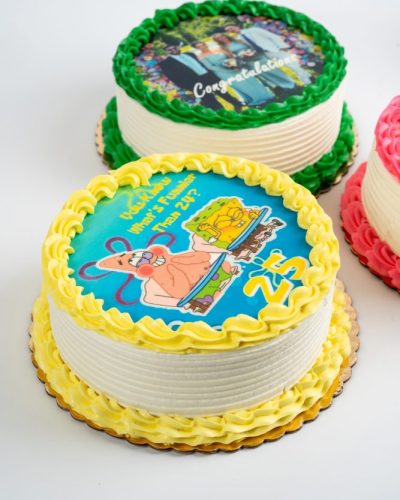 savor the classic flavor of a gluten free edible image cake at Mia's Bakery.